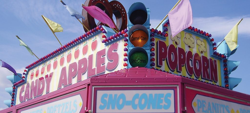 Advertising signs for food at a carnival or Boardwalk
